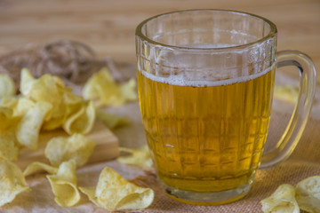 Beer and chips on the table. Octoberfest theme