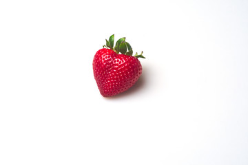 Single heart shaped strawberry.