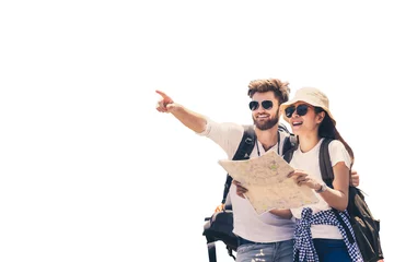 Deurstickers Multi ethnic couple look at map while pointing finger in the direction of destination. Travel concept. Honeymoon trip, backpacker tourist, Asia tourism or holiday vacation travel concept. Isolated. © Thomas