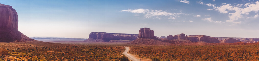 Road among the rock-monuments in the Valley of Monuments, Utah. Natural Attractions of North America