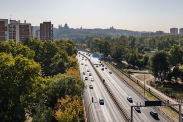 Fototapeta premium Views of Madrid, from the cable car of the Casa de Campo, with air contaminated by pollution