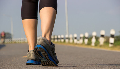 Young women are exercising Weight Control,Closeup leg
