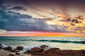 Dramatic sunset with stormy clouds