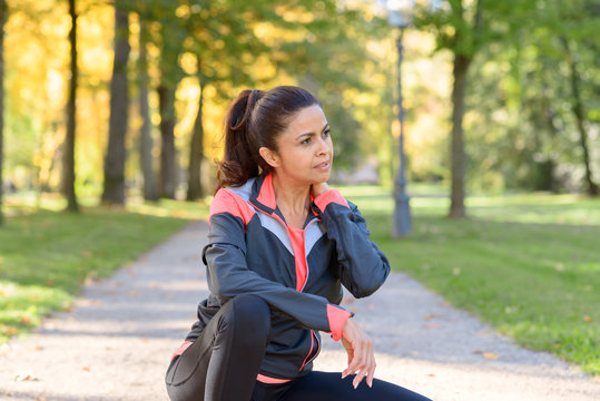 Athletic woman taking a break from a workout