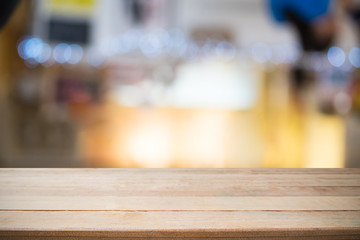 Table wooden desk empty with night bokeh in background for present product.