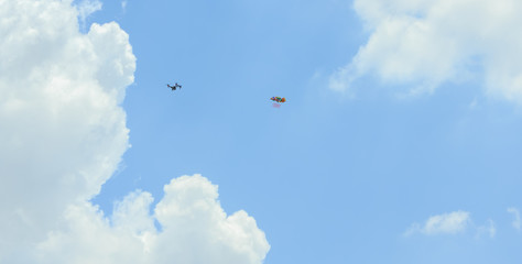 Drones is photographing balloons in the sky.