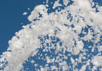 white foam on a blue background