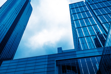 Obraz premium modern office buildings exterior,detail shot,blue toned,shanghai,china.