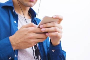 hands in the foreground with the mobile phone on white background