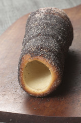 Trdelník with poppy seeds, close up shot