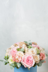Flower composition on a gray background. Wedding and Festive decor. Bouquet from spring flowers. copy space