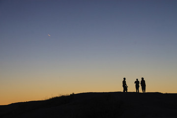 Fototapeta na wymiar Silhouettes at Sunset