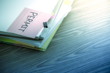 Permit; The Pile of Business Documents on the Desk