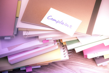 Complaint; The Pile of Business Documents on the Desk