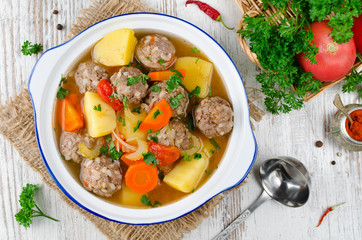 Meatballs in a thick vegetable soup Albondigas