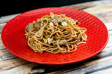 fried beef noodle food on the table