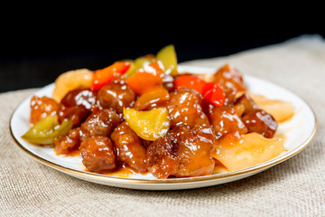 wok fried pork stir fry with sweet peppers and chinese vegetables