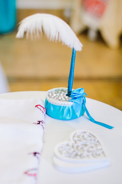 Wedding decor .Arch for carrying out of painting . beautiful wedding feather