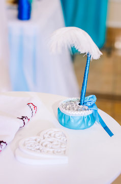 Wedding decor .Arch for carrying out of painting . beautiful wedding feather