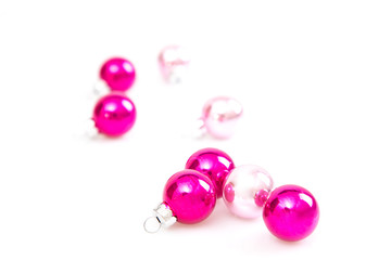 pink christmas balls isolated on white