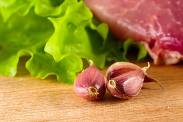 cloves of garlic on a plate