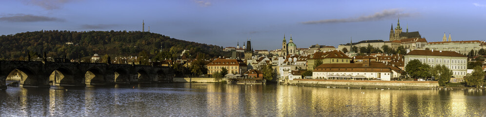 Fototapeta na wymiar Panorama of River Vltava and Charles bridge looking towards Prague castle