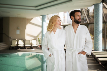 Portrait of attractive couple in spa center