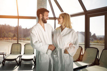 Portrait of attractive couple in spa center