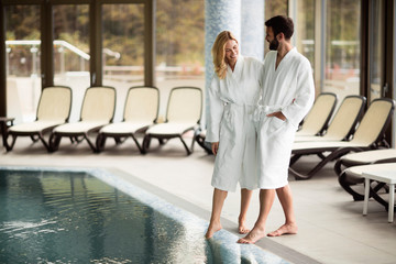 Portrait of attractive couple in spa center