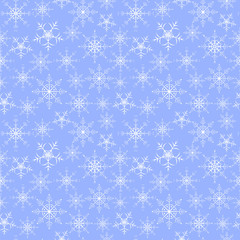 Seamless christmas pattern with white snowflakes on a blue background.