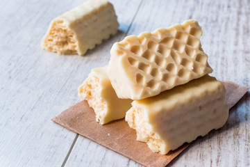 White Chocolate Wafer on wooden surface.