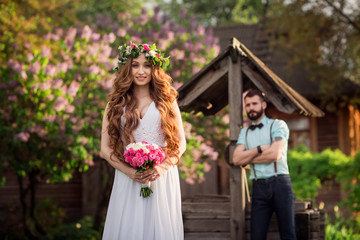 Naklejka premium The groom and the bride in the country.