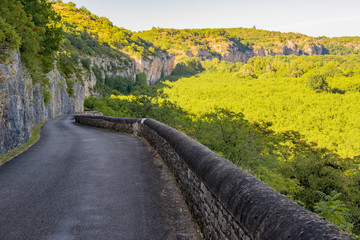 Landscape of road and cliff in the valley of the Dordogne, france - 176969778