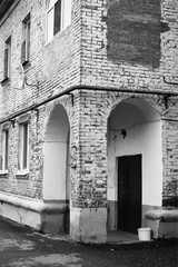 Old brick building with arches. Retro style.