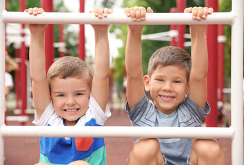 Fototapeta premium Cute boys on playground
