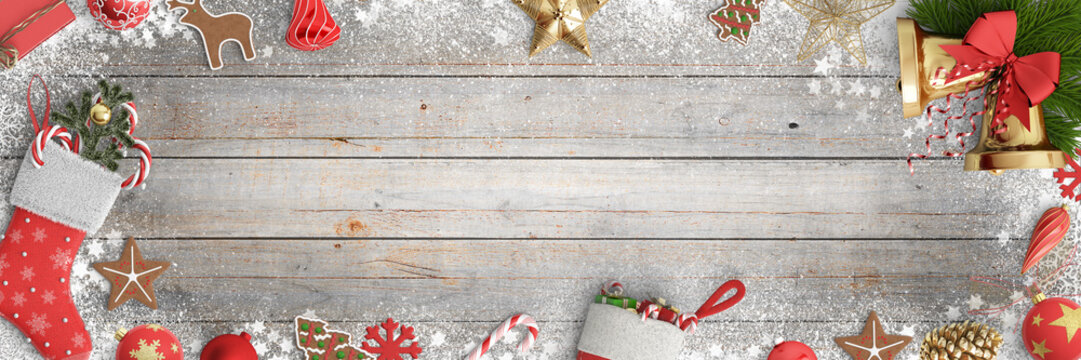 Christmas background with decoration and snow on a wooden board