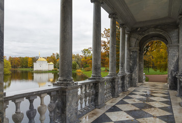 Autumn forest in Pushkin, marble bridge, Saint-Petersburg, Russia