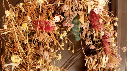Europe's Secret Islands/ An old door knob in dry flowers.
