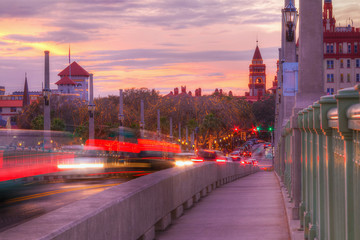 Fototapeta na wymiar Beautiful view of the Bridge of Lions, the sky and the city at sunset, Saint Augustine, USA