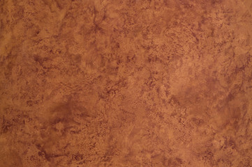 background of the plastered texture with marble effect brown. artistic background handmade