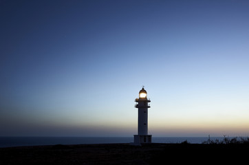 Bereberia Cape Lighthouse in Formentera Island at the sunset