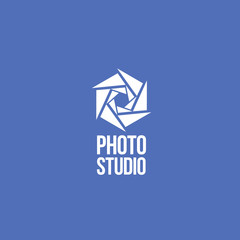 Photo studio logo. Photo emblem. Diaphragm is like a flower on a blue background.