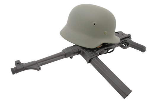 Composition with german battle helmet and  submashine gun