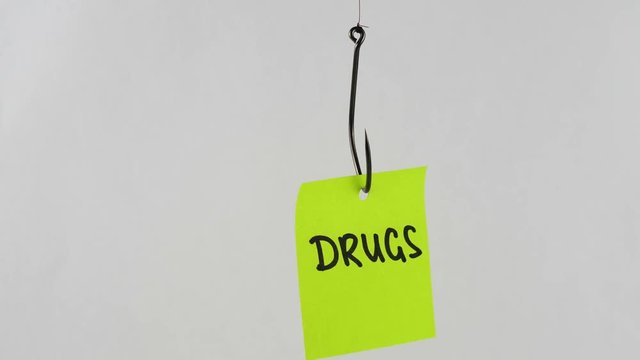 Illustration, on fishhook Drugs