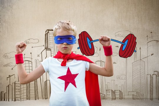 Composite image of portrait of superhero boy with arms raised