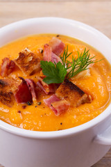Butternut Squash and Bacon Soup in White Bowl, vertical