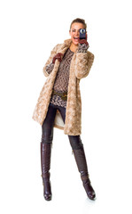 happy modern woman on white taking photo with digital camera