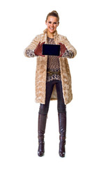 smiling fashion-monger on white showing phone blank screen