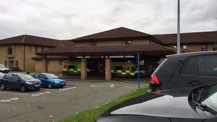 Waiting outside an Accident and Emergency hospital in the UK - Powered by Adobe