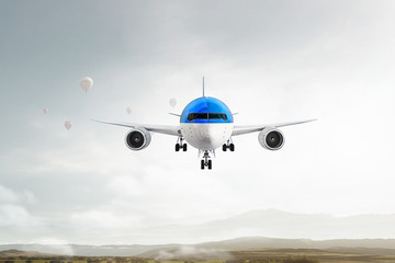 Airliner in sky. Mixed media